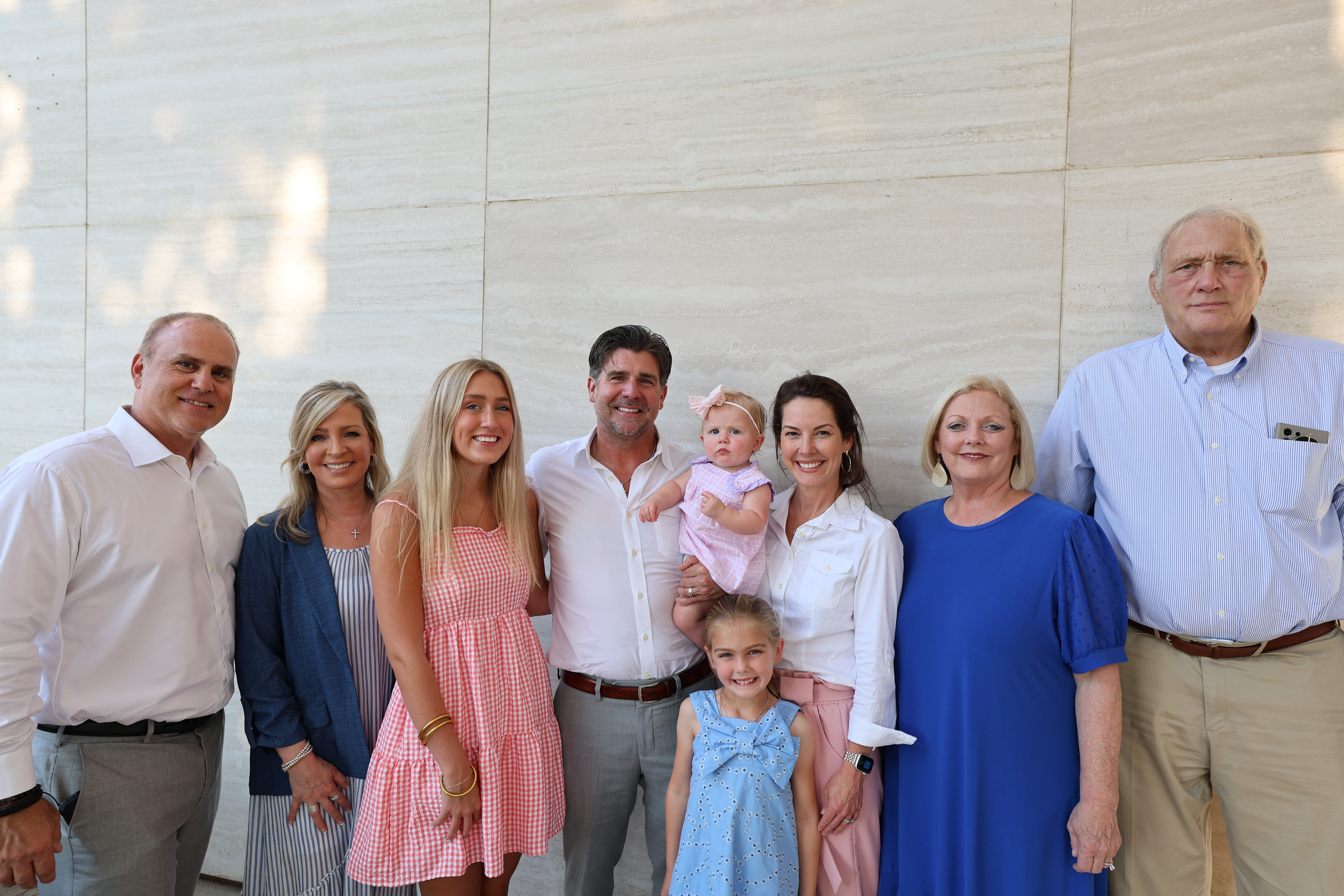 Mr. Jeffrey Waller (middle) pictured with his family at the August 2024 board meeting